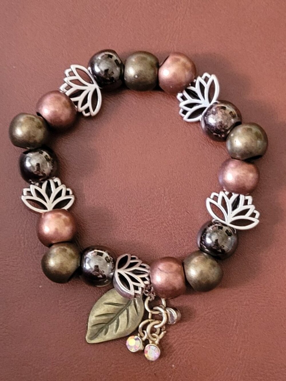 Eye Catching Brown and Silver Wrist Wrap with Charms